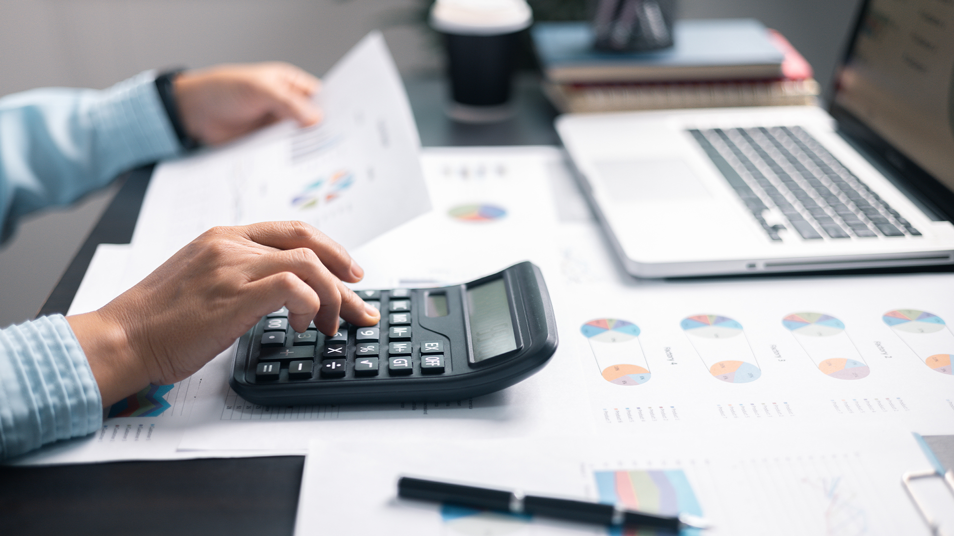 man using calculator