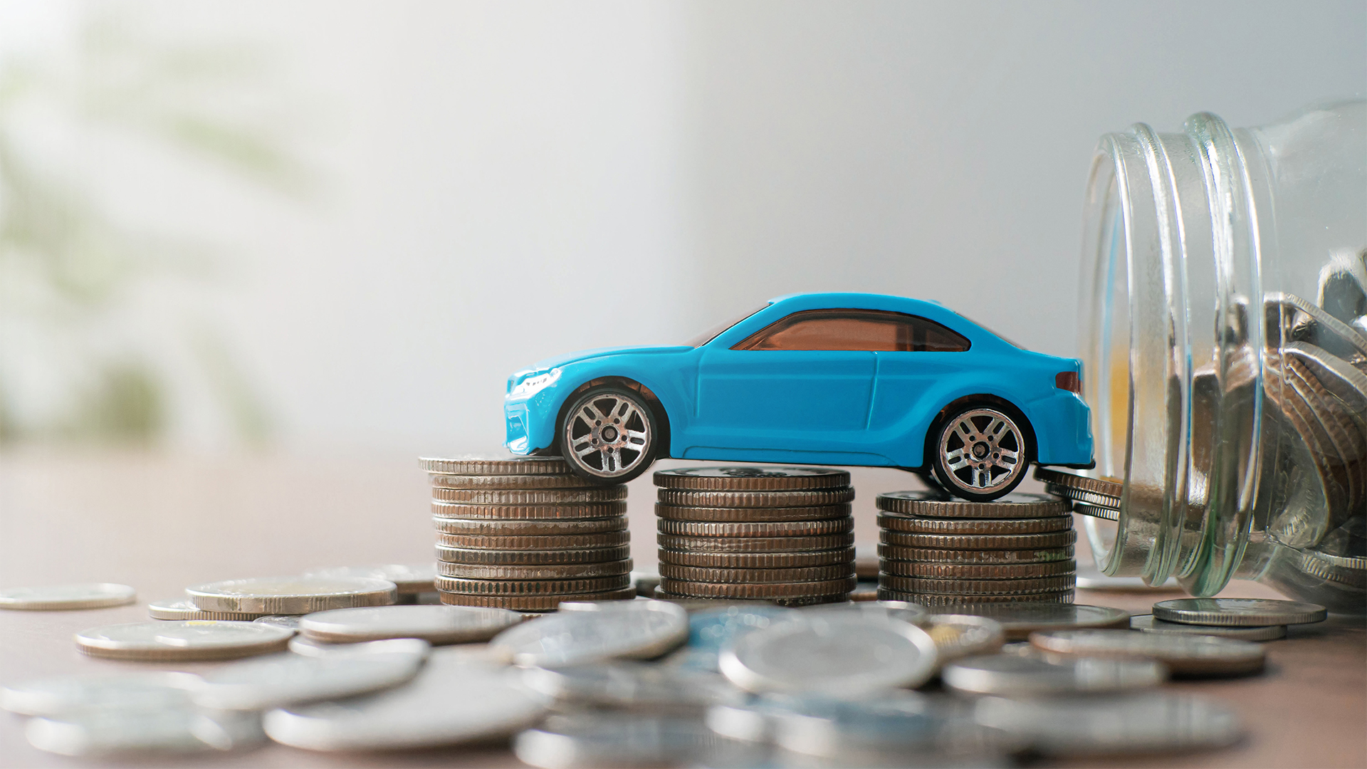 car tax concept financial statements with coins Auto Tax